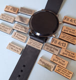 Personalised Watch Tag Charms in Stainless steel and rose gold colours with a black watch