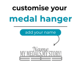 Customizable medal hanger with text 'customise your medal hanger' and 'add your name' on a white background. SA Medal Hangers