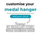Customizable medal hanger with text 'customise your medal hanger' and 'add your name' on a white background. SA Medal Hangers