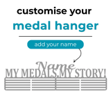 Customizable medal hanger with text 'customise your medal hanger' and 'add your name' on a white background. SA Medal Hangers