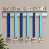 Medal holder with medals and ribbons on a beige wall, featuring 'My Medals. My Story!' text. by SA Medal Hangers