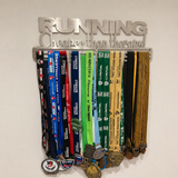 Stainless Steel Medal holder with various medals on a wall, featuring the text 'Running is my Therapy' by SA Medal Hangers