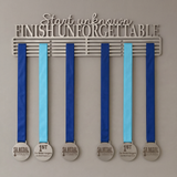 Medal hanger with ribbons and medals on a plain background from SA Medal Hangers Start unknown, finish unforgettable