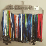 Victory Man on Table Mountain Stainless Steel Personalised Medal Display Hanger SA Medal Hangers. Quote. It's not the mountain we conquer buy ourselves.
