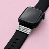 Smartwatch on a wrist with motivational message display, saying when your legs get tired run with your heart on the watch tag