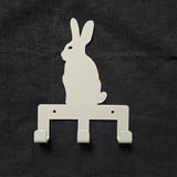 Light grey rabbit-shaped 3 Hooks on a black background