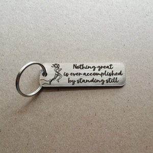 Nothing great is ever accomplished by standing still - Motivational Keyring